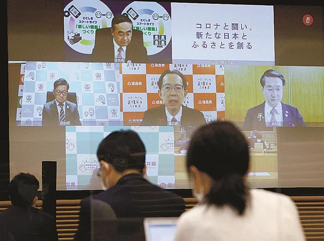 オンラインで開かれた全国知事会の新型コロナウイルス対策本部会合＝２１日午前、東京都千代田区の都道府県会館