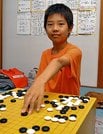 練習に励む和多田光流君＝安来市安来町、安来囲碁教室